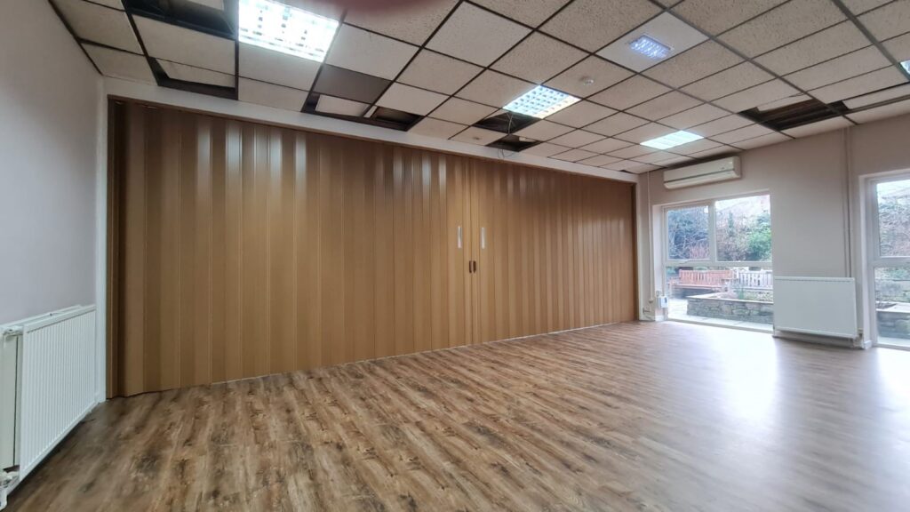 Compacta PVD door installed in a modern social club interior