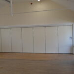 Acoustic folding door. Acoustic folding partition. Spazio Doors. Moveable Walls